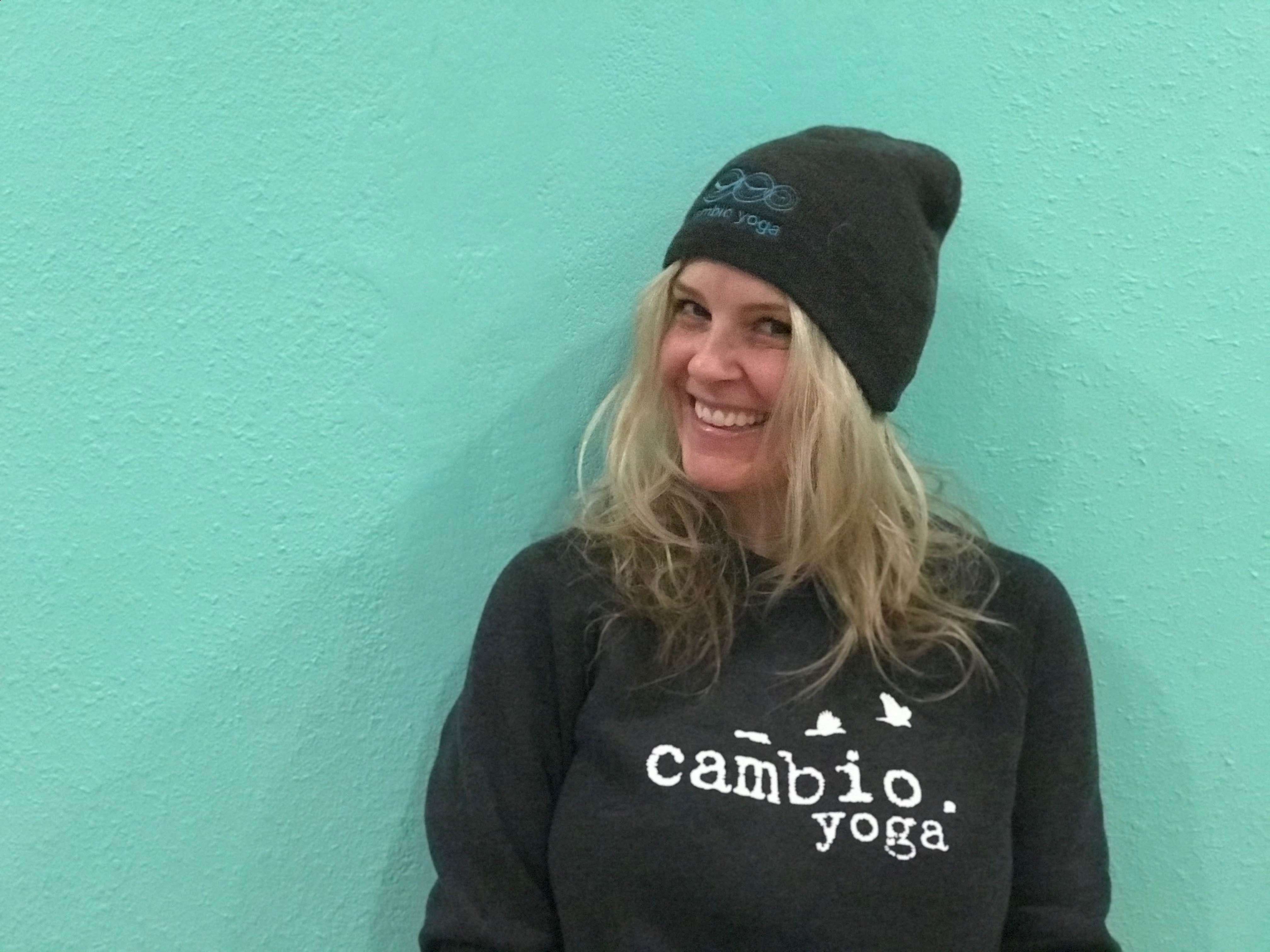 Photo of Erica smiling wearing cambio hoddie and beanie