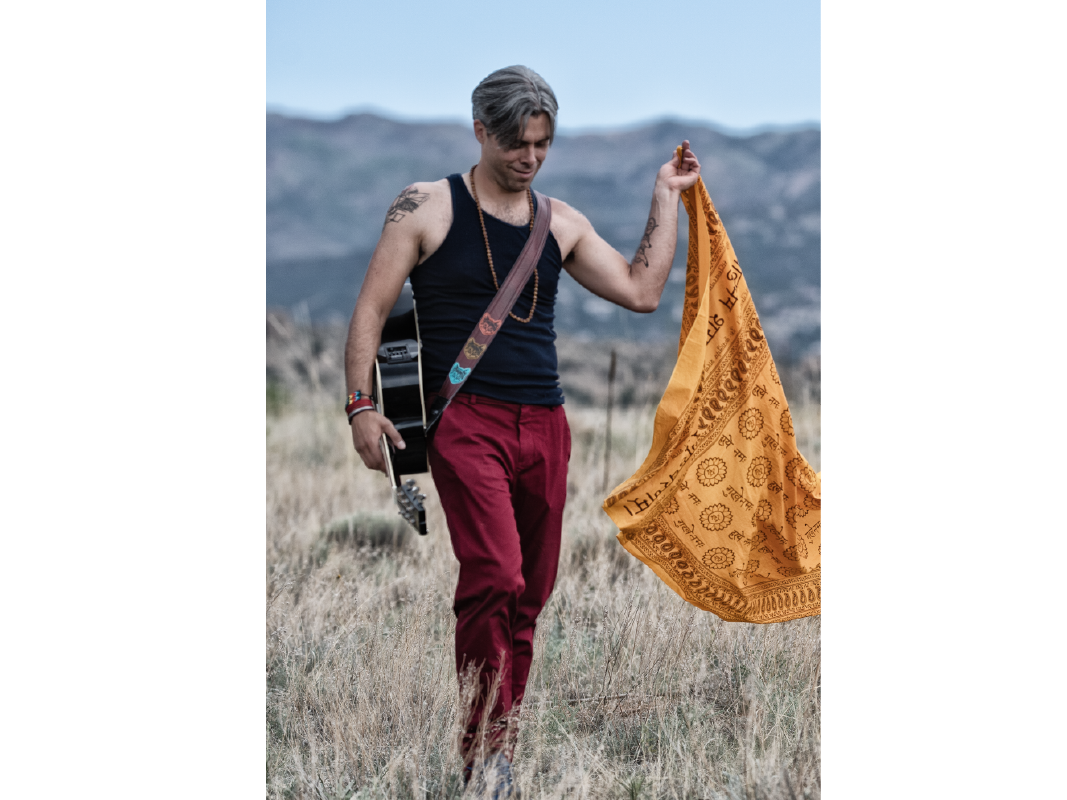 Photo of Austin in a field